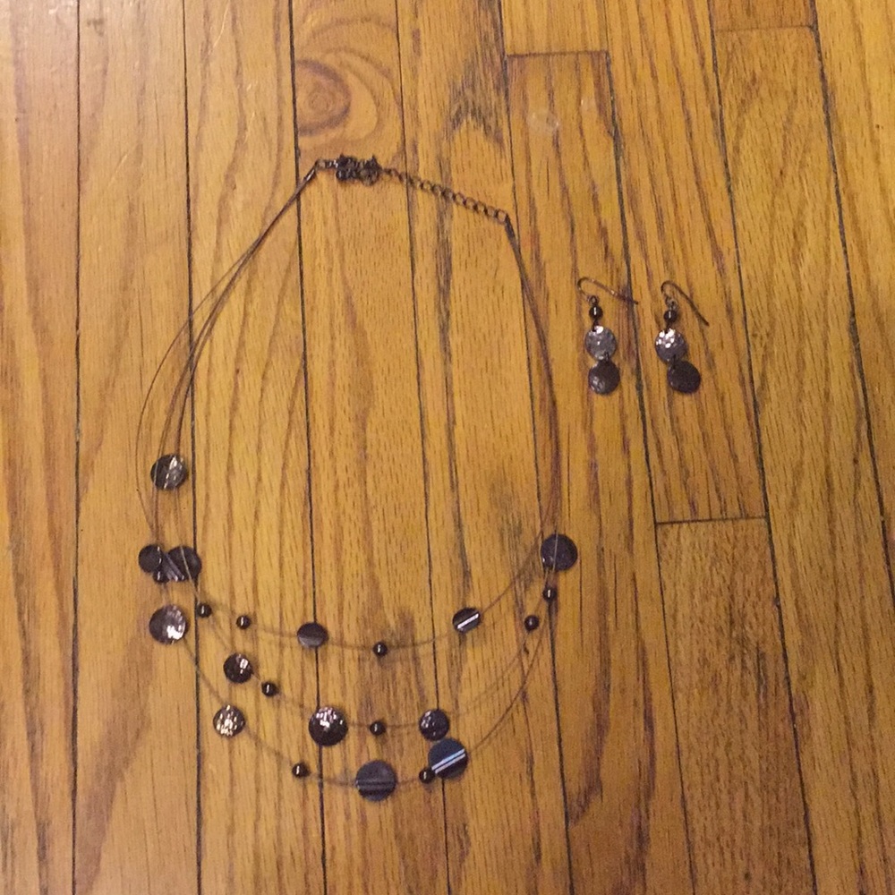 Matching purple earrings and necklace